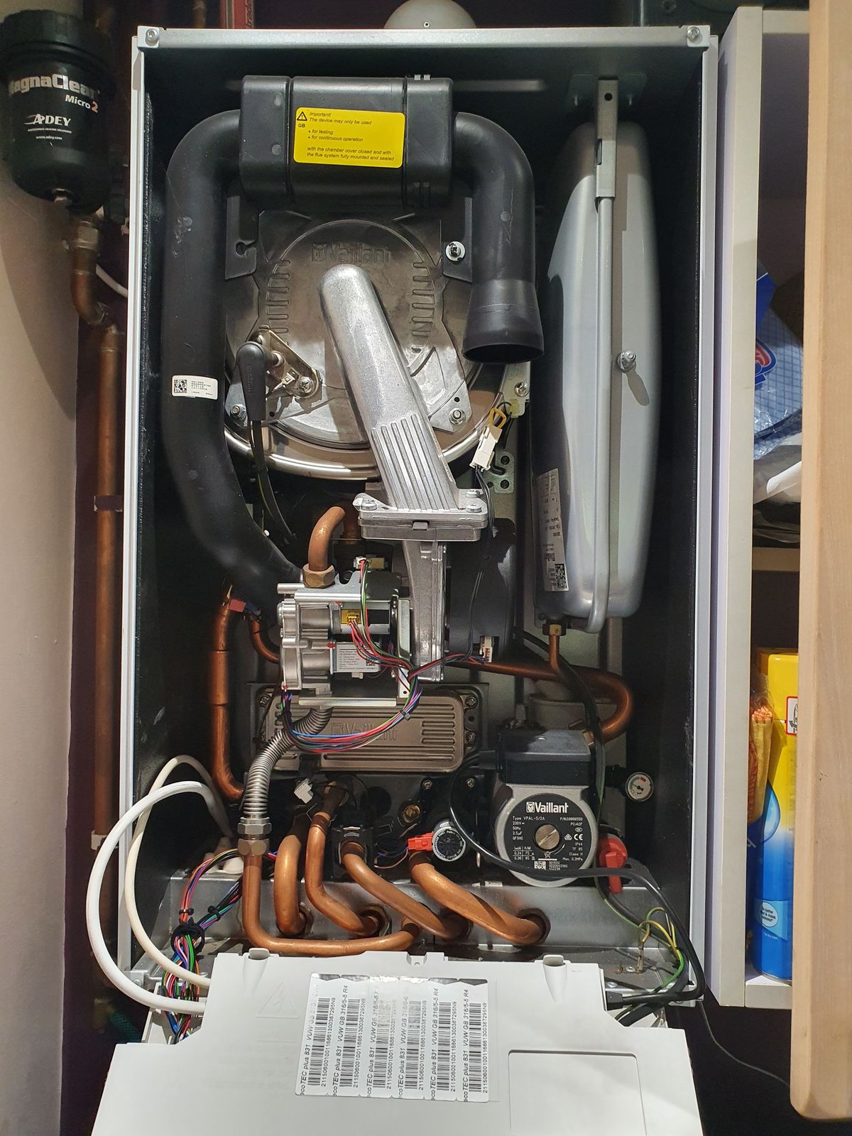 A boiler with its case off during a service